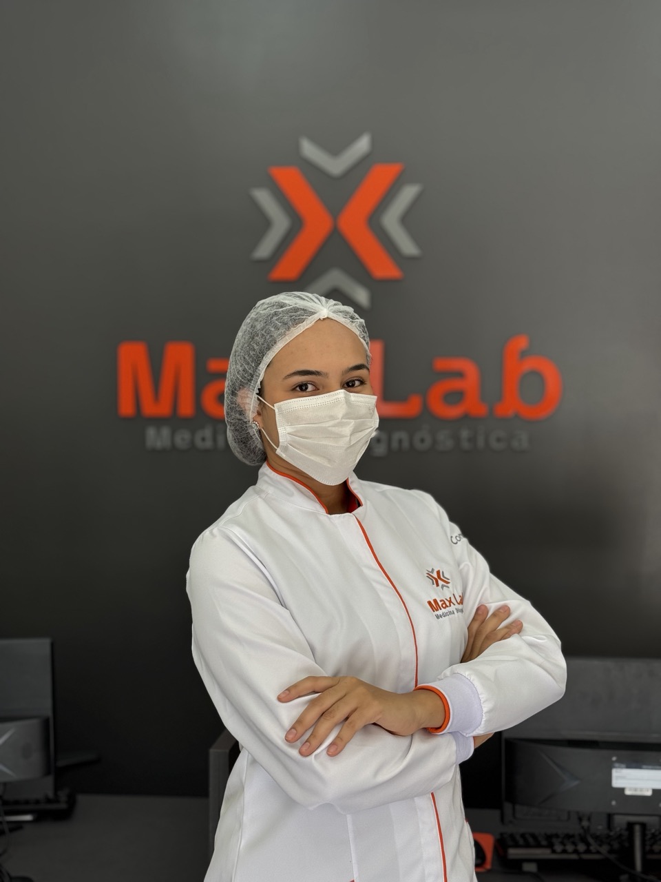 Profissional da Max Lab sorrindo
